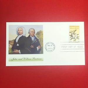 May include: A first day of issue envelope featuring portraits of John and William Bartram. The envelope includes a stamp with a floral design and the text "USA 55". The text "John and William Bartram" is printed below the portraits.