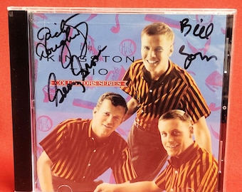 CD de la serie de coleccionistas Kingston Trio de 1990 firmado
