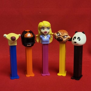 VTG Pez Dispensers Sid the Sloth Home Depot Bratz Cloe Timon of Lion King Panda Lot of 5