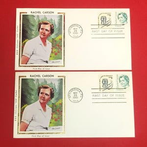 May include: Two First Day of Issue envelopes featuring Rachel Carson. Each envelope has a portrait of Carson, a stamp, and a Springdale, PA postmark dated May 28, 1981. The envelopes are on a red background.
