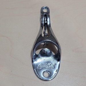 Apribottiglie e cavatappi da parete vintage Coca Cola