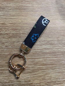 Louis Vuitton Grey Lanyard Keychain ○ Labellov ○ Buy and Sell Authentic  Luxury