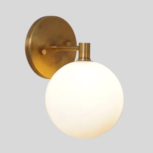 Mid Century Italian Style Glass Globe Wall Sconce - Raw Brass Finish