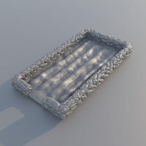 May include: A rectangular, silver-colored tray with a textured border. The interior of the tray has a rippled surface. The border has a woven or braided appearance. The tray is likely made of metal or a similar material.