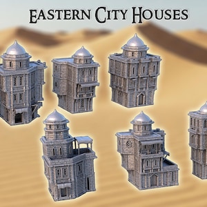 Puede incluir: Colección de casas en miniatura de la ciudad oriental, cada una con intrincados detalles arquitectónicos. Los edificios son de color gris apagado, con tejados abovedados y ventanas ornamentadas. El fondo muestra un paisaje desértico.
