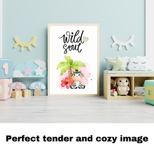 May include: A watercolor illustration of a zebra with a flower crown, sitting under a palm tree with a pink hibiscus flower. The text "wild soul" is written in black cursive above the zebra. The background is a soft pink watercolor wash.