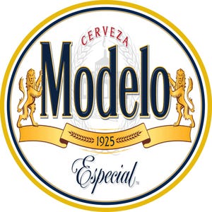 May include: A white oval logo with a gold border and a blue banner. The banner reads "Modelo Especial" with the year "1925" in the center. Two gold lions are on either side of the banner. The words "Cerveza Modelo" are in a gold circle above the banner.