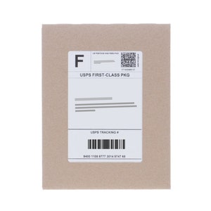 May include: A white USPS First-Class Package label with the tracking number 9400 1108 9777 3014 9747 68.