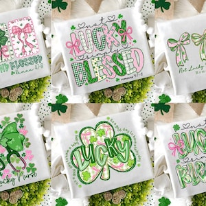 May include: White t-shirts with St. Patrick's Day designs. The shirts feature text like "Lucky and Blessed," "Not Lucky Simply Blessed," and "One Lucky Nurse." Designs include shamrocks, bows, and hearts in green and pink.