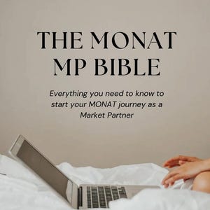 May include: A laptop computer is open on a white bedspread. The screen is blank. The text "THE MONAT MP BIBLE" is displayed above the laptop. The text "Everything you need to know to start your MONAT journey as a Market Partner" is displayed below the laptop. The text "@SHANTALMCMANUS" is displayed at the bottom of the image.