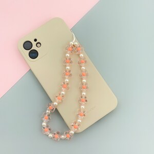 Peach flower beaded phone strap