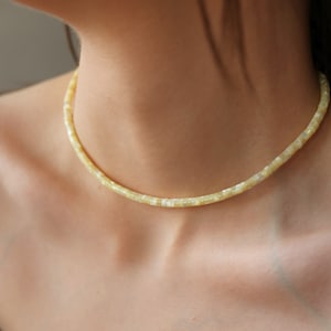 Light yellow mother of pearl tube beaded necklace