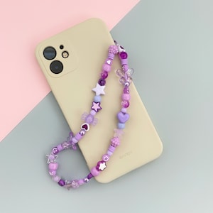 Different purple beaded phone strap