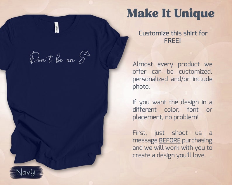 May include: A navy blue t-shirt with the text "Don't be an S" in white. The shirt is customisable and the text can be changed. The text "Make It Unique" is at the top of the image.