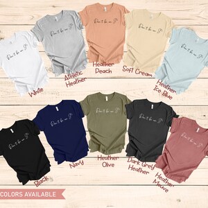 May include: A range of t-shirts in various colours, including white, black, navy, heather peach, heather olive, heather grey, heather ice blue, heather mauve, and athletic heather. Each shirt features the text "Don't be a  " in a white script font.