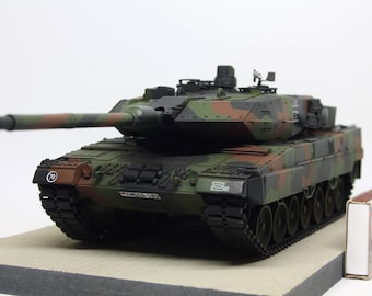 Built tank Leopard 2 A5/A6 in 1/35 scale on a wooden base plate