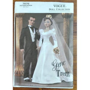 May include: Vogue Doll Collection pattern featuring Gene and Trent dolls. The Gene doll is dressed in a white wedding gown with a veil and bouquet. The Trent doll is in a black tuxedo. The pattern number is 7676.