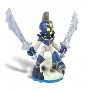 May include: A blue and gold action figure of a warrior holding two silver swords. The figure has a blue helmet with yellow accents and is standing on a skull-shaped base. The figure is a toy.