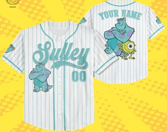 May include: White baseball jersey with light blue pinstripes, featuring the name "Sulley" and the number "00" in light blue. The jersey has a cartoon image of a blue monster on the front and back, with the text "Your Name" on the back.
