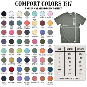 Puede incluir: Una tabla que muestra una variedad de colores de camisetas unisex Comfort Colors 1717. La tabla incluye muestras de color y una tabla de tallas con medidas en pulgadas. La camiseta es de color verde.