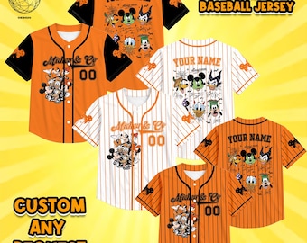 May include: A collection of short-sleeve baseball jerseys featuring Disney character graphics, including Mickey Mouse, Pluto, and Maleficent. The designs include orange and white pinstriped or solid orange options with black sleeves, button-front closures, and the text "Mickey & Co" and "Your Name".