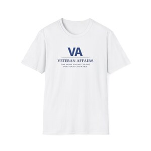 May include: White t-shirt featuring the navy blue text "VA VETERAN AFFAIRS ONE MORE CHANCE TO DIE FOR YOUR COUNTRY". The shirt has a round neck and short sleeves.
