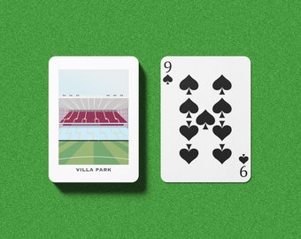 May include: A playing card with a picture of Villa Park, a football stadium, and a playing card with the number 9 of spades.
