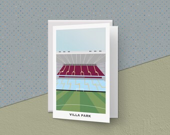 May include: A white card with a colorful illustration of a soccer stadium, with the words "VILLA PARK" printed at the bottom.