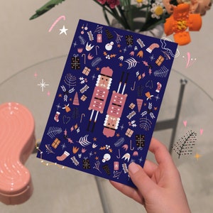 Biglietto di auguri di Natale con illustrazione dello schiaccianoci e busta