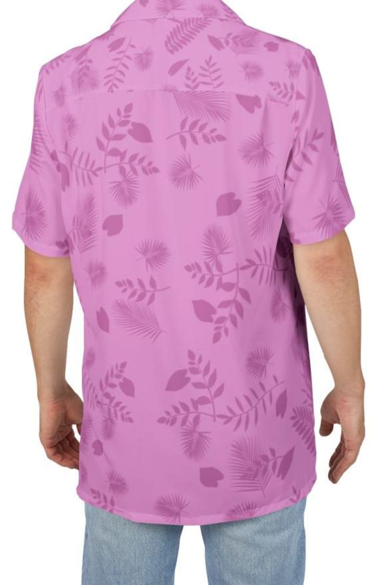 May include: A short-sleeved, button-down shirt in a light purple hue, adorned with a repeating pattern of stylized leaves and botanical elements. The shirt's design features a classic collar and a relaxed fit, suitable for casual wear.