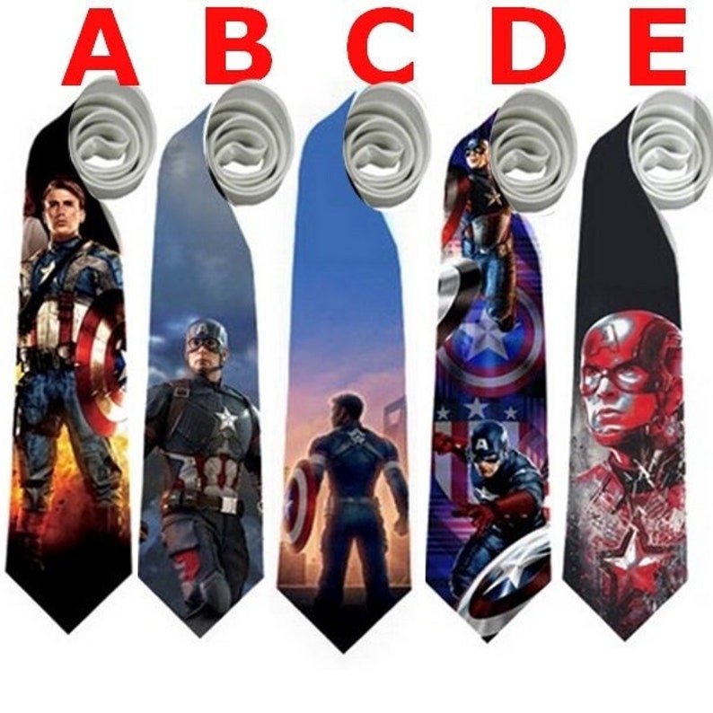 May include: Five neckties featuring Captain America designs. Each tie displays a different image of the superhero, with varying backgrounds and poses. The ties have a standard shape and are made of a smooth material.