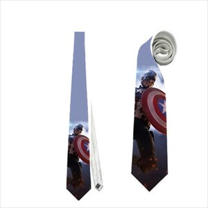 May include: A light blue tie featuring Captain America holding his shield. The tie has a repeating image of the superhero and his shield. The tie is made of a smooth material and is suitable for formal or casual wear.