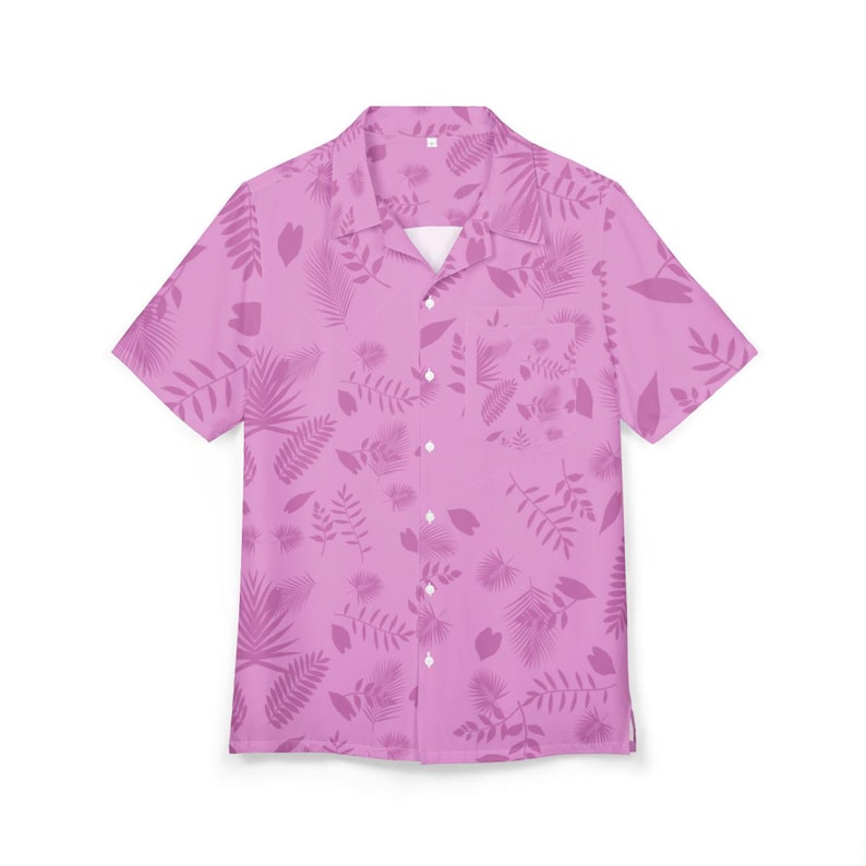 May include: A short-sleeved button-down shirt in a light pink hue, adorned with a subtle pattern of various leaves and floral elements. The shirt features a classic collar and a chest pocket, perfect for casual wear.
