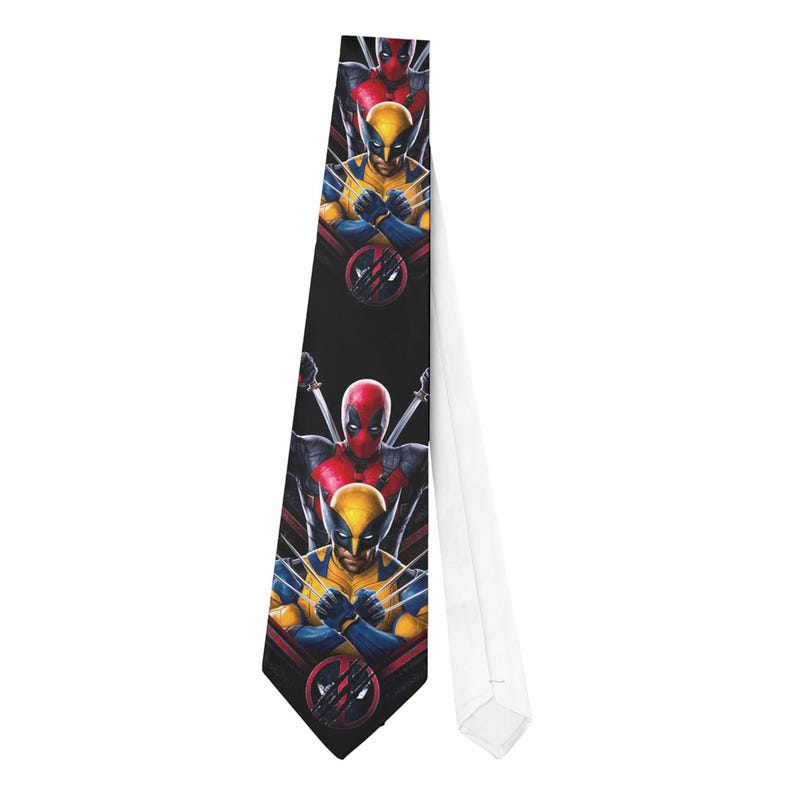 May include: Black necktie featuring illustrations of Deadpool and Wolverine. The tie has a white back and a black front with red and blue accents. The design includes the characters' logos and images of the characters in action.
