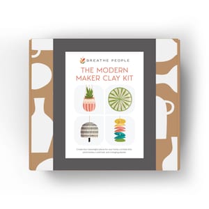 May include: A rectangular cardboard box for The Modern Maker Clay Kit by Breathe People. The packaging features a tan background with white pottery silhouettes and a central white label displaying four clay project illustrations and text.