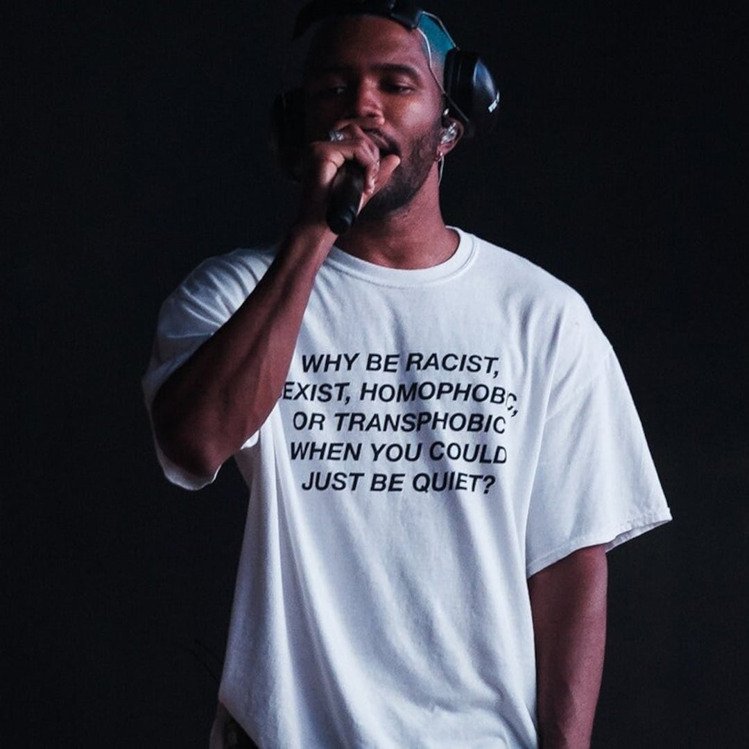 Frank Ocean at the 2017 Panorama Festival wearing a T-shirt inscribed with the words WHY BE RACIST, SEXIST, HOMOPHOBIC OR TRANSPHOBIC, WHEN YOU COULD JUST BE QUIET? It was a quote that