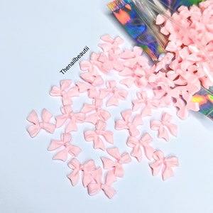 Pink bow nail charms