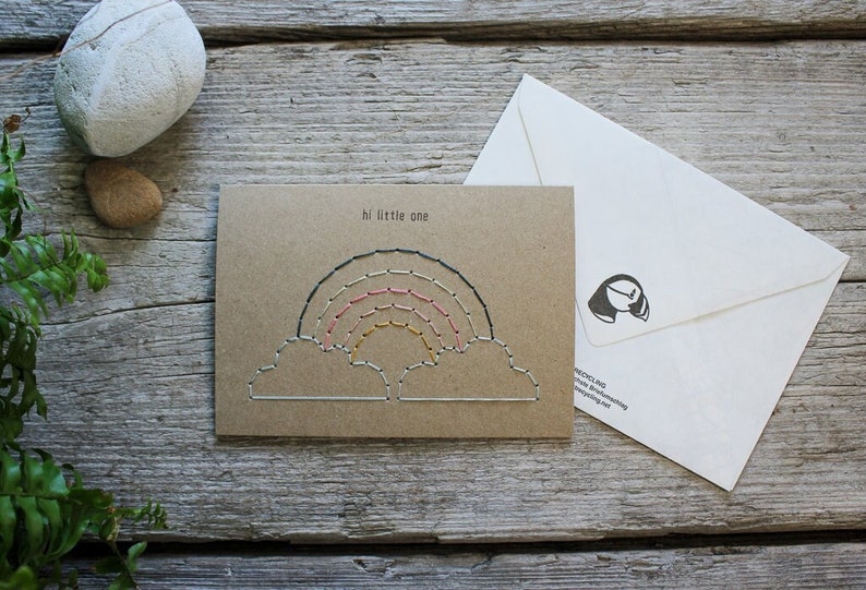 Hand stitched hi little one baby and expecting card with rainbow design on brown paper and with a white map envelope by Misprinted Mind.