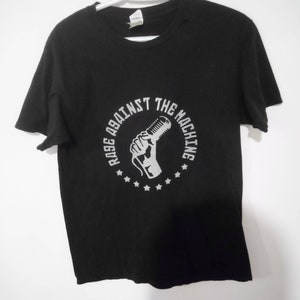 Rage against the machine size large