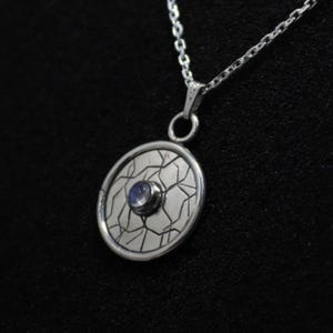 Irish Craft Pendant with 4 mm Rainbow Moonstone. Sterling Silver.