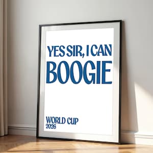 May include: A framed vertical poster with a white background and dark blue text. The text reads "YES SIR, I CAN BOOGIE" in large capital letters, followed by "WORLD CUP 2026" in smaller text at the bottom left. The frame is thin and black.