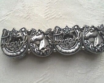 Vintage Western Themed Cowgirl Horseshoe Bracelet/Rhinestones, Stars, Horses, Word "cowgirl" charms/Silver Tone/Stretchy