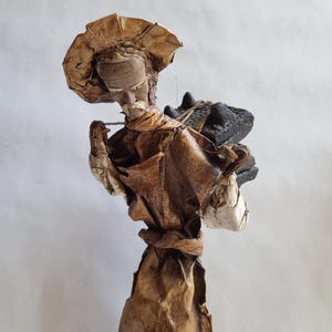 Vintage Mexican Paper Mache Folk Art &quot;Viejito&quot; Old Man Figurine carrying Four miniature stone metates (grinding stones)/Wooden Base/Mexico