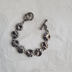 Vintage Silver-Plated Puppy Dog Paw Prints Bracelet/Eight Etched Charms Animal Paw Prints shaped/Toggle Clasp/The Brand BEST marked on back