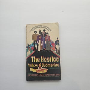 VINTAGE The Beatles Yellow Submarine: Nothing is Real by Lee Minoff/Sergeant Pepper's Lonely Hearts Club Band/1968 First Printing Signet PB