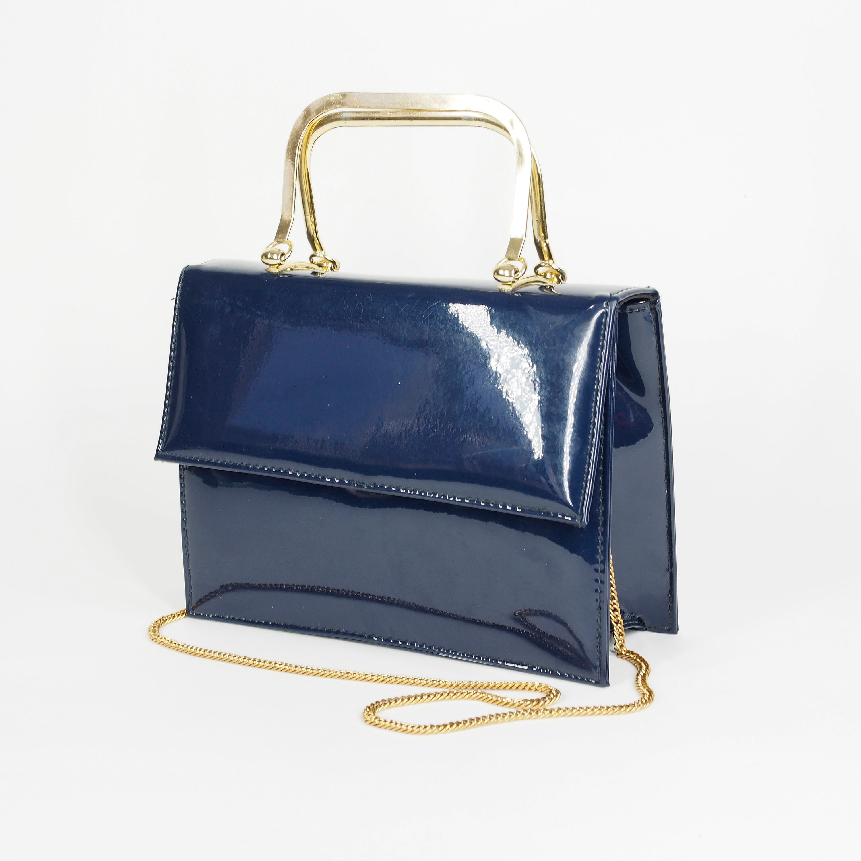Navy blue patent leather handbag sale hotsell