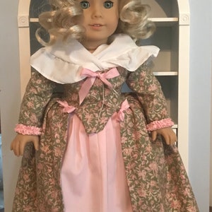 1780s Robe A l’ Anglaise for 18” dolls, green and pink spring ensemble with hat, shoes, and fichu.