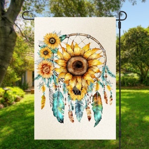 May include: A watercolor illustration of a dreamcatcher with sunflowers and feathers. The dreamcatcher is made of brown wood and has a white net. The sunflowers are yellow and have brown centers. The feathers are blue and brown.