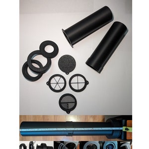 Pode incluir: Um conjunto de acessórios de telescópio pretos que inclui dois tubos de extensão, quatro anéis de tamanhos diferentes e três tipos diferentes de defletores. Os tubos de extensão medem 28 cm de comprimento.