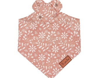 May include: A pink bandana with a white floral pattern and the text "The Luxe Pet" in the bottom right corner.